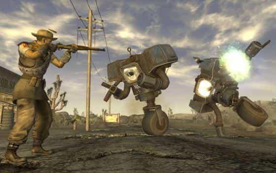 Скриншот человека, стреляющего в двух роботов в игре Fallout: New Vegas